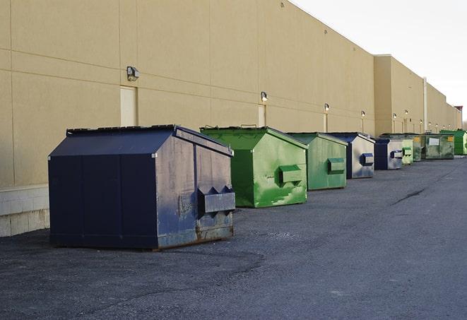 a pile of rugged and heavy-duty dump containers ready for construction waste in Lemon Grove